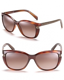 Stylish rounded cat eye sunglasses with subtle F accents along arms and temples.