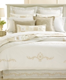 Relax in ultimate comfort with these 300-thread count Egyptian cotton Trousseau Crest pillowcases from Martha Stewart Collection.