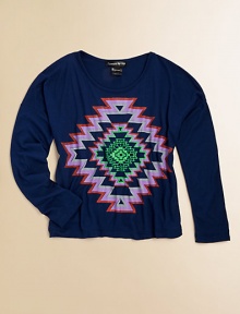 A brilliant tribal print adds a splash of color and coolness to a long-sleeved tee.ScoopneckLong sleevesPullover styleRayonHand washImported