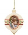 In the shape of a classic Christmas ball, this ornament from Lenox lets you add a personal touch to your tree with a picture frame center. With gold hanging thread.