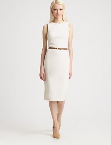 Both timeless and modern, this chic crepe design features a slender leather belt woven through metal grommets at the waist.Jewel necklineSleevelessMetal grommets at waistIncluded leather beltBack ventBack zipAbout 32 from natural waist99% wool/1% spandexDry cleanMade in ItalyModel shown is 5'10 (177cm) wearing US size 4. 