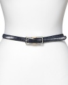 Lauren by Ralph Lauren's belt in halting red is in croco-embossed leather and reverses to a smooth black leather for modern versatility. Crafted with a two-tone reversible, rectangular buckle that rotates from silver to gold-tone on a single screw.