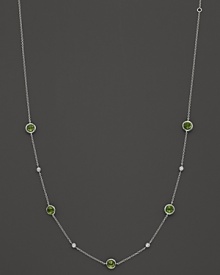 Bezel set diamonds and peridot stones in a sterling silver chaing from Ippolita.