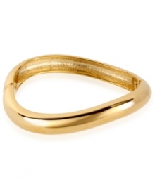 Robert Lee Morris makes waves with this hinged bangle. Crafted from gold-tone mixed metal, the bangle stands out with its special design. Approximate diameter: 2-1/4 inches.