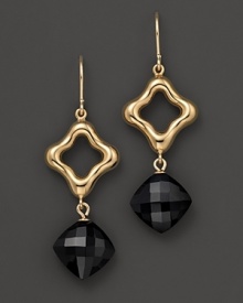 Faceted onyx shines darkly in yellow gold settings.