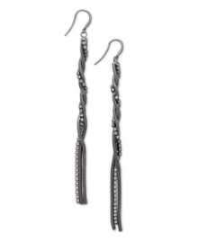 Dust your shoulders with this sparkling style. Alfani's chic, linear earrings highlight rows of twisted crystals set in hematite tone mixed metal. Approximate drop: 4-3/4 inches.