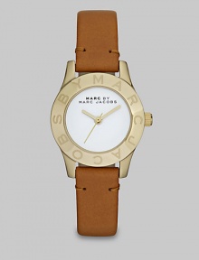 Simply chic timepiece with a luxuriously supple leather strap. Quartz movementWater resistant to 5 ATMRound goldtone stainless steel case, 26mm (1)Logo etched bezelWhite enamel dialSecond hand Tan leather strapImported 