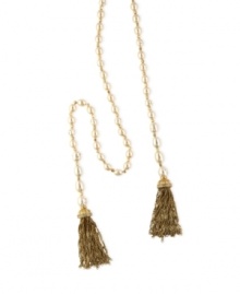 A chic tassel accent brings a textured look to this Jones New York necklace. The long strand is embellished with plastic pearls and beads. Crafted in worn gold tone mixed metal. Approximate length: 36 inches.