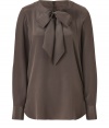 A ladylike bow adds instant chic appeal to this silk top from Steffen Schraut - Round neck with bow, long sleeves with button cuffs, slim fit, concealed back zip closure - Pair with skinny jeans, slim trousers, or a pencil skirt