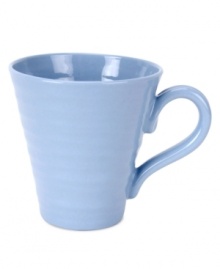 Like a blooming bed of forget-me-nots, this powder-blue porcelain dinnerware has a fresh, natural vibrance. A hand thrown texture gives the contemporary mug the irresistible charm of traditional pottery.