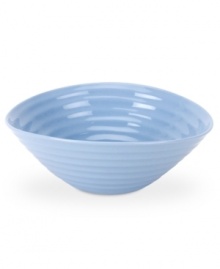 Like a blooming bed of forget-me-nots, this powder-blue porcelain dinnerware has a fresh, natural vibrance. A hand thrown texture gives the contemporary cereal bowl the irresistible charm of traditional pottery.