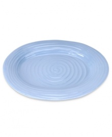 Like a blooming bed of forget-me-nots, this powder-blue porcelain serveware has a fresh, natural vibrance. A hand thrown texture gives the contemporary oval platter the irresistible charm of traditional pottery.