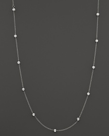 Diamond stations shine on an elegant white gold necklace.