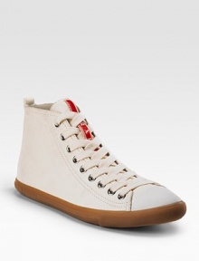 Leather high-top sneakers with logo detail. Shaft, 3½ Leg circumference, 9½ Leather lining Rubber sole Padded insole Imported 