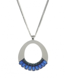 Strikingly shaped. A unique oval pendant serves as a chic setting for brilliant blue baguette crystals on this Kenneth Cole New York necklace. Crafted in hematite tone mixed metal. Approximate length: 30 inches + 3-inch extender. Approximate drop: 2-7/10 inches.