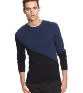 A luxe cotton blend in a colorblocked design. Style this Calvin Klein crew neck sweater with slim-cut trousers for a modern silhouette.