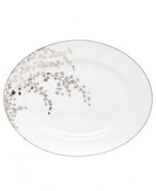 An instant classic from kate spade new york, this Gardner Street Platinum oval platter exudes contemporary elegance. Stems of platinum foliage flourish on fine white bone china, creating a stylized two-tone floral motif to freshen up your formal table.