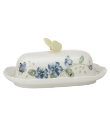 A floral and butterfly pattern featuring monarchs, dragonflies, tiger swallowtails and blue butterflies lends your tabletop a romantic, whimsical sensibility. This lovely covered butter dish is as eye-catching as it is useful. Measures 8.75 long. Qualifies for Rebate