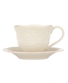 With fanciful beading and a feminine edge, this Lenox French Perle cup and saucer set is a great addition to your white dinnerware and has an irresistibly old-fashioned sensibility. Hard-wearing stoneware is dishwasher safe and, in a soft white hue with antiqued trim, a graceful addition to any meal. Qualifies for Rebate