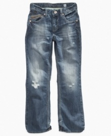 Casual comfort and cool style. That's exactly what he'll get in these straight-fit jeans from Guess.