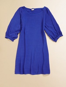 Puffed, three-quarter sleeves and a standout back zipper make this not-so-basic frock uniquely adorable.ScoopneckThree-quarter puff sleevesBack zipperRayonMachine washImported