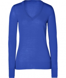 Building a coveted capsule wardrobe is easy with stylish staples like Iris von Arnims royal blue pullover - Sumptuously soft in a luxe, lighter weight merino wool knit - Fitted, feminine cut tapers gently through waist and hits below hips - Long sleeves and flattering v-neck - Oversize rib trim at cuffs and hem - Versatile and classically chic, seamlessly transitions from work to weekend - Pair with everything from suit trousers and pencil skirts to skinny denim and leather pants