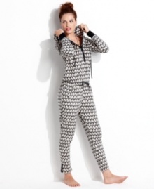 Warm and snuggly from head to toe. Kensie's hooded jumpsuit features contrasting cuffs and placket with a snap closure.