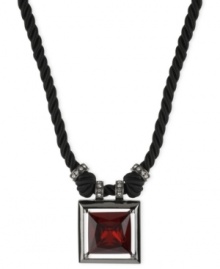 Dark tones dazzle in this pendant from Kenneth Cole New York. Dangling from a twisted cord is a square pendant crafted from hematite-tone mixed metal with a red faceted stone at the center for a bold statement.  Approximate length: 18 inches + 3-inch extender. Approximate drop: 2 inches.