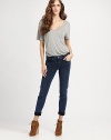 Acid-wash makes a comeback in ultra slim-fit denim, cuffed at the hem for effortless-chic.THE FITFitted through hips and thighsRise, about 8Inseam, about 31THE DETAILSZip flyFive-pocket style98% cotton/2% elastaneMachine washMade in USA of imported fabricModel shown is 5'11 (180cm) wearing US size 4.