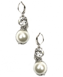 Sparkle all day long Givenchy's dazzling drop earrings. Polished glass pearls and round-cut crystals make these perfect for day and night. Crafted in silver tone mixed metal. Approximate drop: 1-5/8 inches.