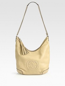 Blending the line between fashionable and practical this spacious bag can be worn on one shoulder or across the body. LeatherLight gold hardwareSingle shoulder chain straps with leather shoulder pad, 20 dropOption to be worn on one shoulder or across the bodyTop zip closureEmbossed interlocking GDetachable leather tasselNatural cotton linen liningMedium size: 13.4W x 11H x 3DMade in Italy