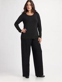 Sleek and chic, a soft tee with long sleeves that is a must-have this season. ScoopneckLong sleevesPull-on styleAbout 25 from shoulder to hem 95% viscose/5% spandexMachine washImported of Italian fabric