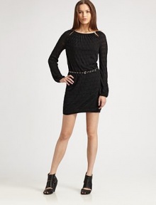 Featuring irresistibly alluring cutout shoulder details, this knit dress is a must-have this season.BoatneckLong sleevesCutout shoulder detailsPull-on styleAbout 22 from natural waist48% viscose/26% acrylic/26% woolDry cleanImported Model shown is 5'11 (180cm) wearing US size 4. Additional Information Women's Premier Designer & Contemporary Size Guide 