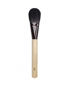 An oversized, luxurious goat hair face brush with a small handle for effortless storage and transportation. Designed for face powder and bronzer.