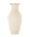 Canterbury bells spring from ivory porcelain, giving this Lenox Floral Meadow vase a delightfully understated grace. A band of sumptuous gold adds to its classic allure. Qualifies for Rebate