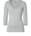 Stylish T-shirt in light grey stretch rayon - very soft and pleasant quality - low V-neck - sleeves in discreet 3/4 length, ideal for women who dont like to reveal their arms or wear the top at the office - slim and slightly waist fitted - new basic - feminine and comfortable alternative for a blouse - wear with a pant suit, pleated skirt, cardigan