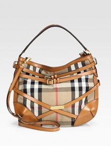 Rich leather wraps around pure cotton, adding sophisticated style to the classic Burberry check. Leather top handle, 4½ dropAdjustable, detachable leather shoulder strap, 22-24½ dropTop zip closureOne inside zip pocketTwo inside open pocketsCotton lining15W X 12H X 6DMade in Italy