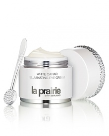 La Prairies White Caviar Illuminating Systeme brightens your skin with an innovative approach to controlling the appearance of discoloration, while offering the legendary benefits of caviar.Unprecedented brightening, supporting and luxury are yours in an illuminating collection so unique you will think of it as a ritual of enlightenment. Imperial caviar, so scarce and desirable it was once reserved for royalty, is at the heart of the White Caviar Illuminating Systeme.Achieve unparalleled brightening for the most expressive part of your faceyour eyes! This sheer, hydrating cream targets the appearance of darkness in the eye area that can be caused from hyper-pigmentation or circulation issues. It brightens, supports and smooths as it targets eye-area aging concerns; the appearance of dark circles, puffiness and wrinkles.The Benefits: Helps to detoxify and boost micro-circulation to help brighten under eye darkness Helps to diminish under eye puffiness and gives a relaxing effect that smooths expression lines and wrinkles Skin is nourished, moisturized and protected against future damage with potent anti-oxidantsThe Application:Apply to under eye area, continuing over the top of the lid and along the brow bone- upwards to the eyebrows. Avoid getting into eyes.Usage:Use AM and PM.