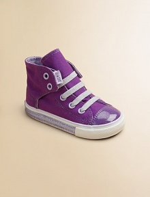 Classic kicks with a hint of sparkle for your little princess. Lace-up closureRubber soleTraditional Chuck insoleCotton canvas liningImported