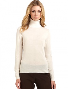 THE LOOKTurtleneckRibbed trimTHE FITAbout 22 from shoulder to hemTHE MATERIALCashmere/silkFully linedCARE & ORIGINDry cleanImportedModel shown is 5'9½ (176cm) wearing US size Small. 