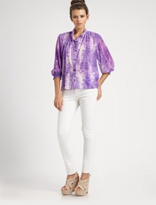 An easy-fit button-down shaped by soft pleats at the shoulders and gathered three-quarter sleeves, all in tie-dyed stretch silk.Band collarButton-down placketThree-quarter sleevesShirred cuffsShirttail hemBack yokeAbout 24 from shoulder to hem96% silk/4% spandexDry cleanImportedModel shown is 5'10 (177cm) wearing US size Small.