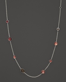 Faceted doublets of clear quartz, almond, smoky quartz and mother-of-pearl in sterling silver. By Ippolita.