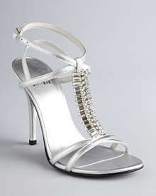 Dazzle in sensationally strappy Stuart Weitzman evening sandals, in a forever stylish silhouette with statement-making jeweled details. They're special enough for a wedding--even your own.