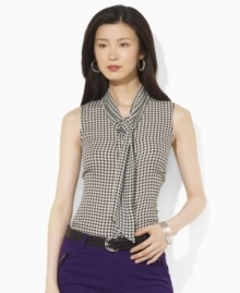 A bold houndstooth pattern sweeps across Lauren by Ralph Lauren's silk georgette blouse, accented with scarf ties at the neckline for a glamorous finish