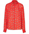 A cheeky leopard print covers this anything-but-dull vibrant button-down from Paul & Joe Sister - Small rounded spread collar, long sleeves, buttoned cuffs, front button placket, allover print, shirttail hemline - Relaxed fit - Try with cropped trousers, an oversized cardigan, and high heel oxfords