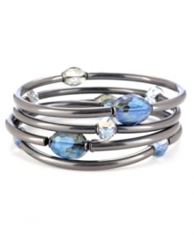 Fashionably faceted. Beautiful blue glass beads adorn this stylish set of four stretch bracelets from Kenneth Cole New York. Crafted in hematite tone mixed metal, their stretch design offers a comfortable, flexible fit. Approximate diameter: 2-3/4 inches.