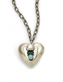 THE LOOKPendant silhouetteHeart pendantGreen Swarovski crystal accentsSilverplated settingTHE MEASUREMENTPendant width, about 1.5Pendant length, about 1.75Length, about 30ORIGINMade in USA