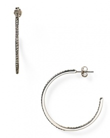 These striking Judith Jack hoop earrings work a simple vibe, but they're exquisitely crafted too-finished in sterling silver with marcastite stone accents.