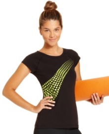 Tee up: Ideology's sport top features breathable stretch cotton fabric and a cute dotted graphic design. Perfect for every workout from yoga to cycling!