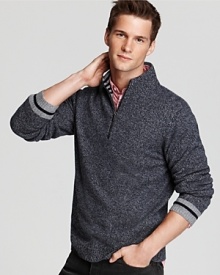 A soft, marled cashmere sweater keeps you warm whether you're outside building a snowman or sipping cocoa by the fire.